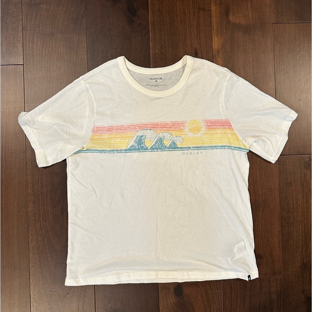 Women Hurley size  xl t shirt. Cream with waves and sun